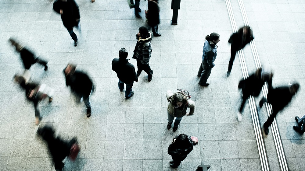 People walking in a tube station - slightly blurred