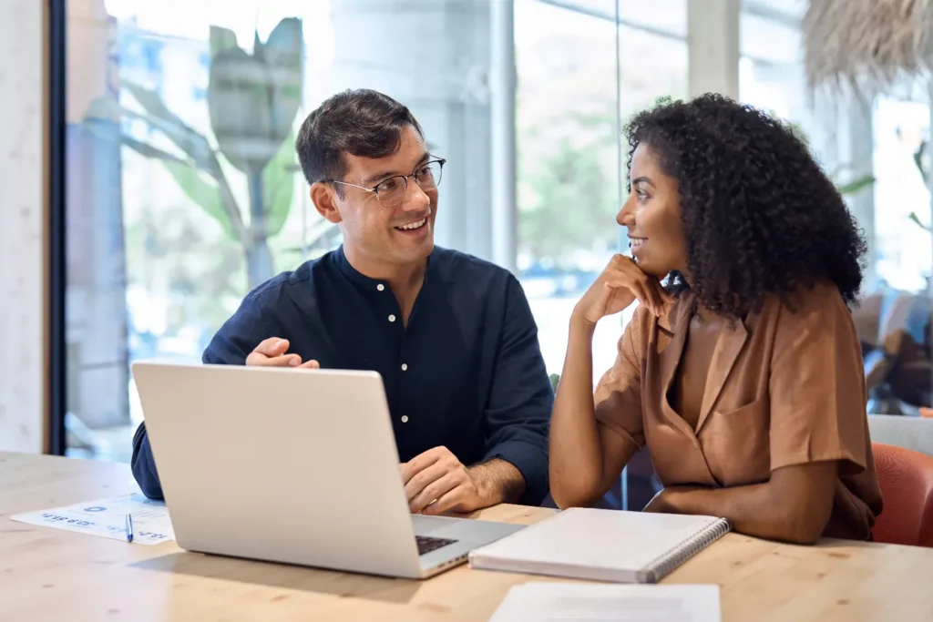 Colleagues in discussion in an office