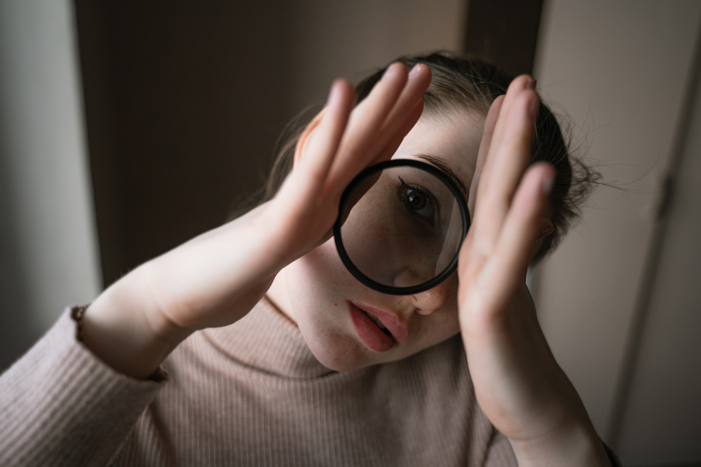 Portrait,Of,A,Girl,Holding,A,Lens