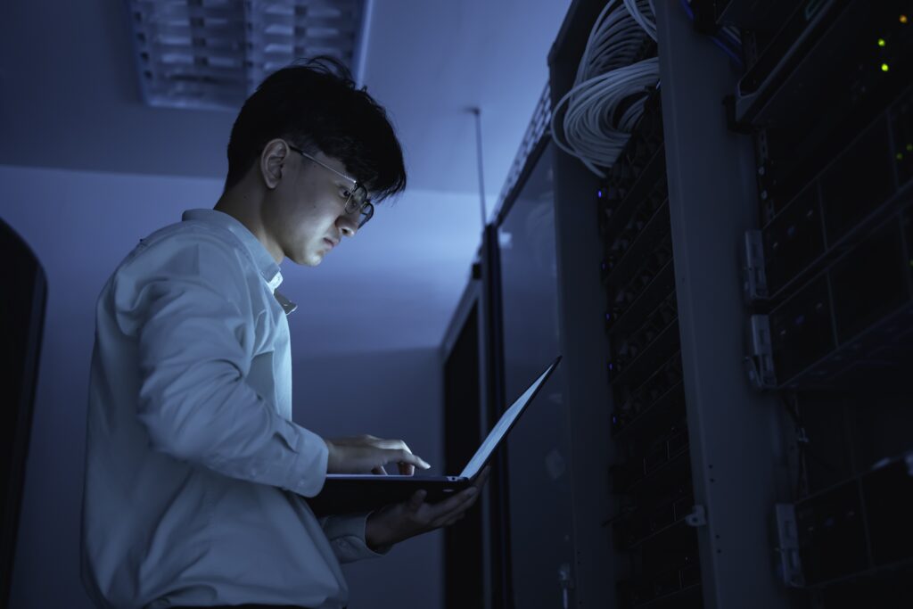 Computer,Engineer,Is,Setting,Up,Network,In,Server,Room,systems,Maintenance